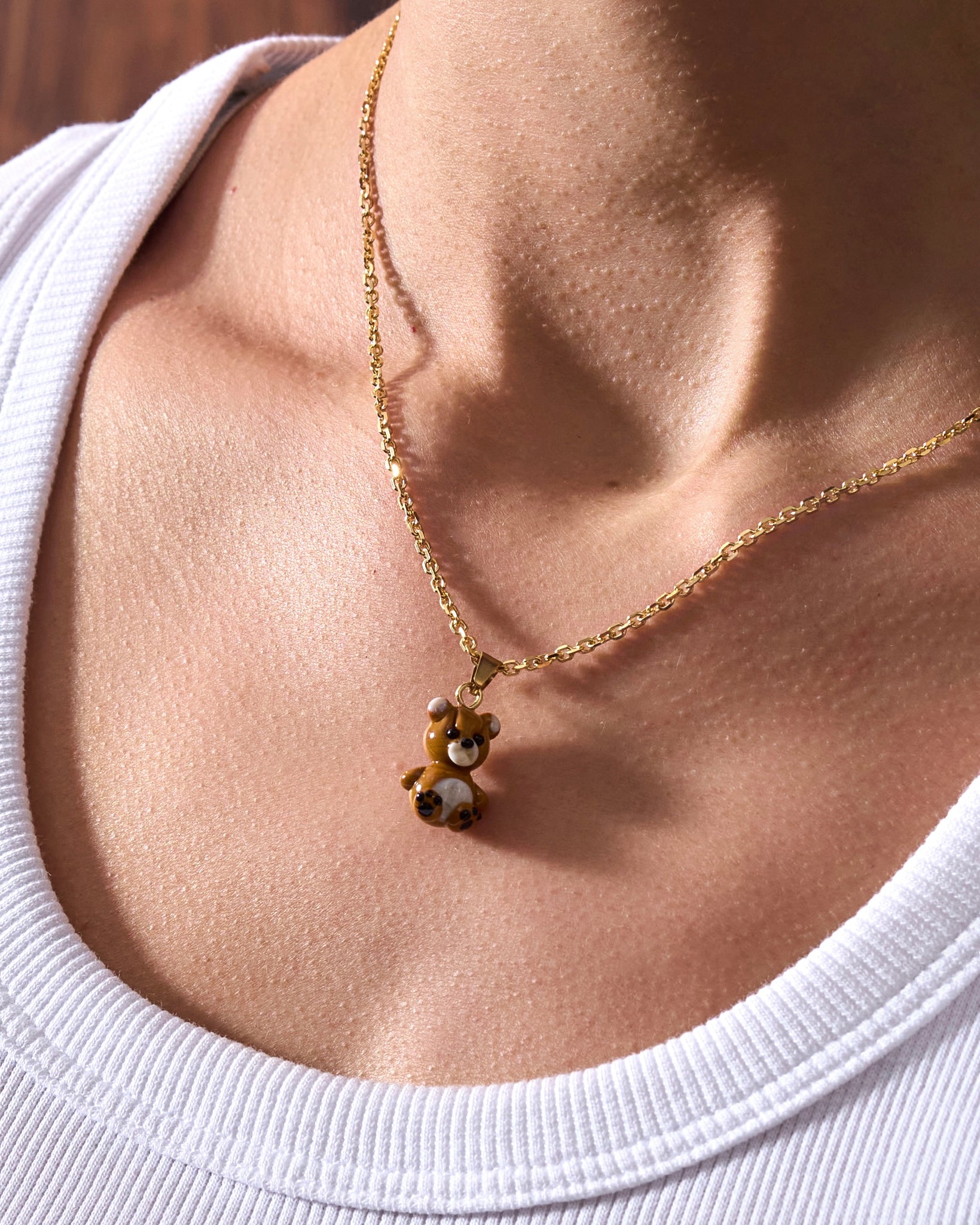 gold necklace with Teddy Bear charm